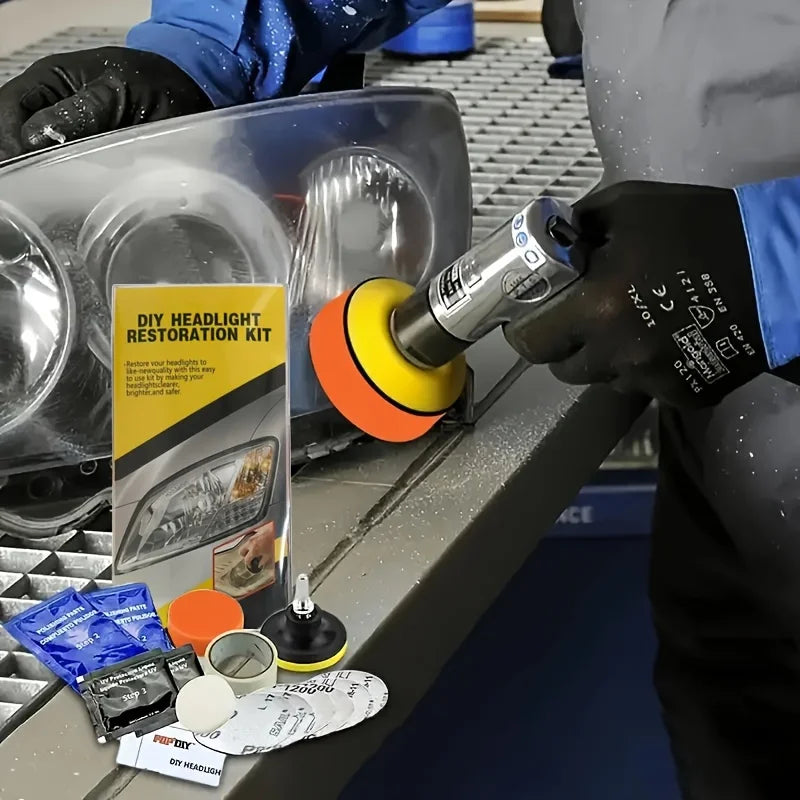 A person wearing black gloves uses a yellow and orange orbital buffer to restore a clear car headlight. A DIY headlight restoration kit with various tools and papers is laid out on a workbench next to the headlight.