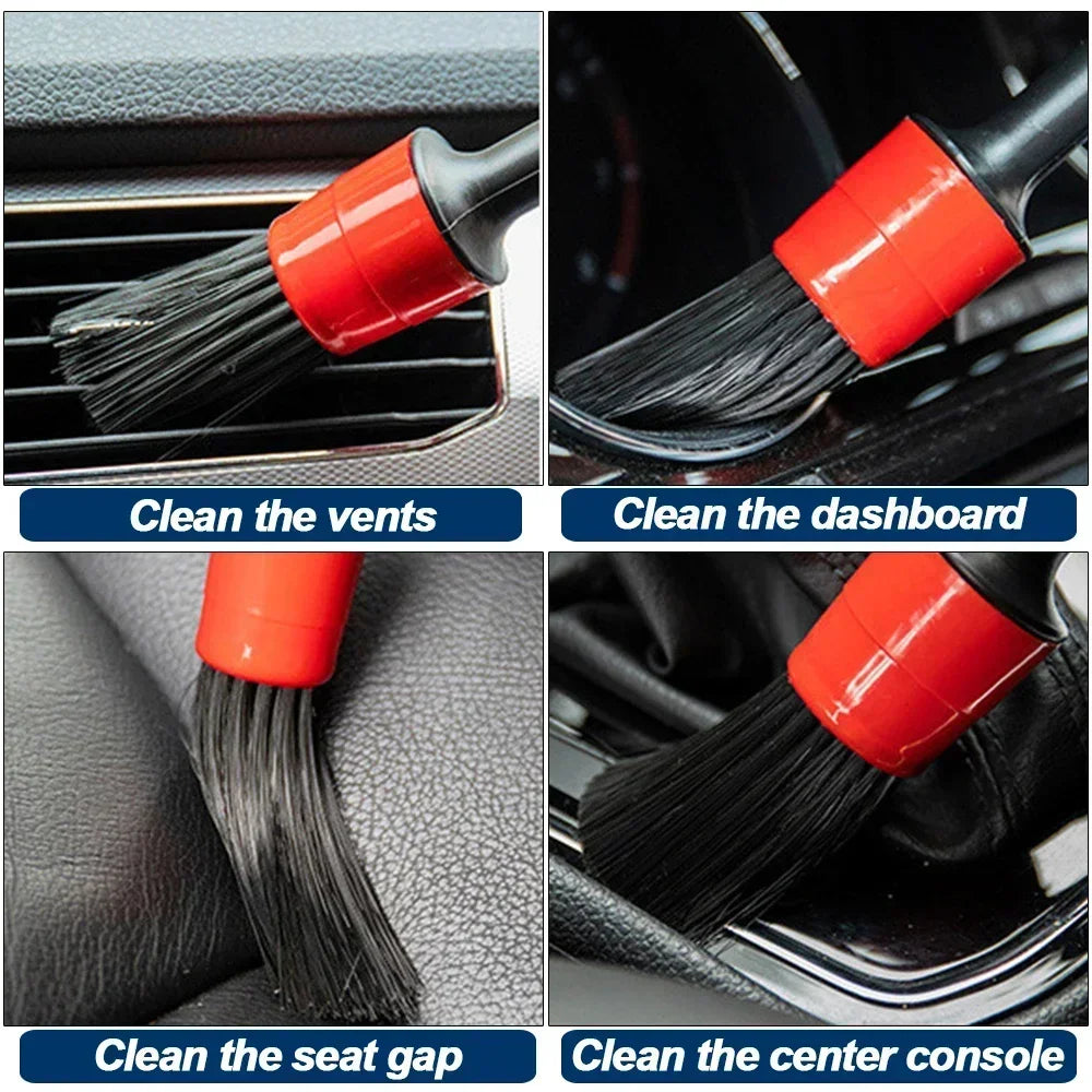 Car cleaning brush with red handle and black bristles used to clean car vents, dashboard, seat gap, and center console.