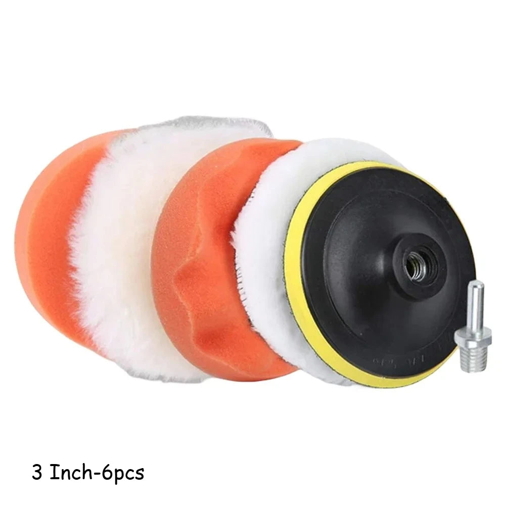 Set of three polishing pads with a black and yellow center and an additional pad on a white background.