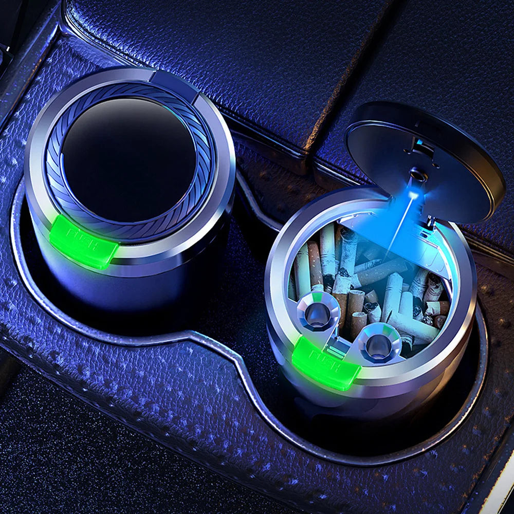 Car cup holder with ashtray and cigarette butts inside, illuminated by blue light.
