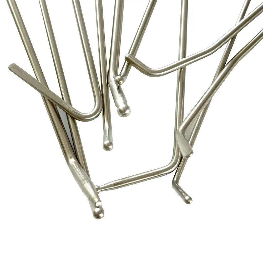 Close-up of metal wire basket on a white background